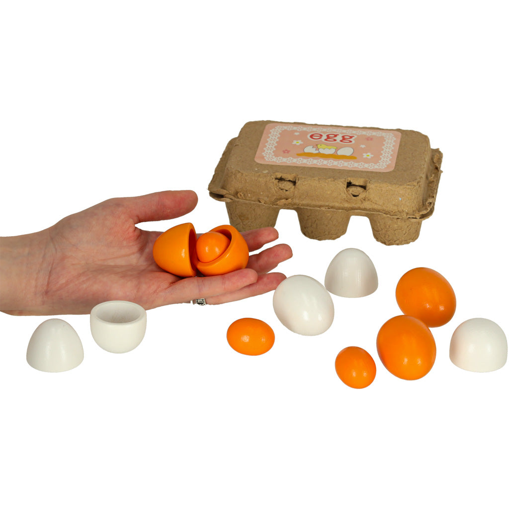 Oua de jucarie, Zola®, detasabile, cu galbenusuri din lemn, 6 buc si cutie depozitare, 15.5x10x6 cm Oua de jucarie, Zola®, detasabile, cu galbenusuri din lemn, 6 buc si cutie depozitare, 15.5x10x6 cm